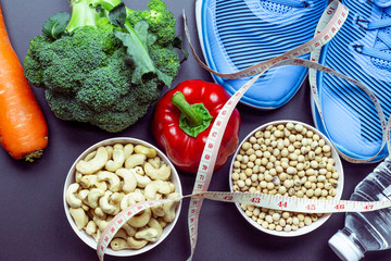 Healthy food concept,broccoli, peppers, carrots, whole grains, water.