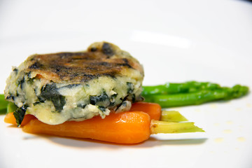  grilled vegetable with butter on white plate