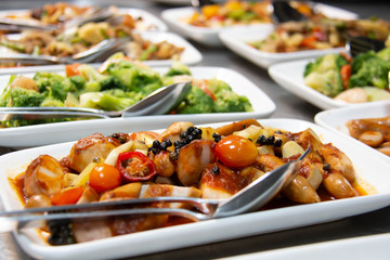  mixed sausage with tomato sauce in plate