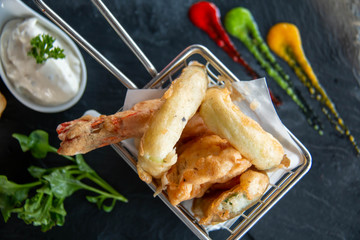  deep fried seafood in a basket