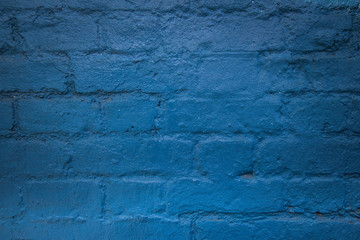 Brick wall painted in blue