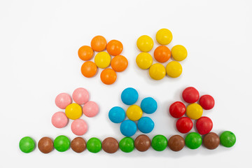 Flower arrangement laid out of multi-colored round jelly beans