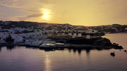 Aerial drone panoramic photo of picturesque old port in main village of Mykonos island at sunrise with beautiful colours, Cyclades, Greece