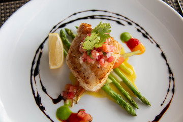  delicious fish steak on white plate