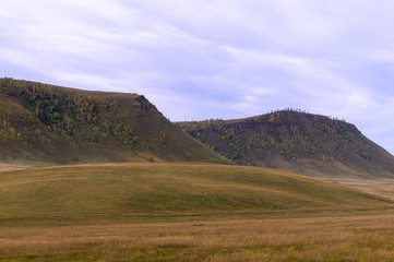 Obraz premium Hills. The clouds. Sky. Steppe.