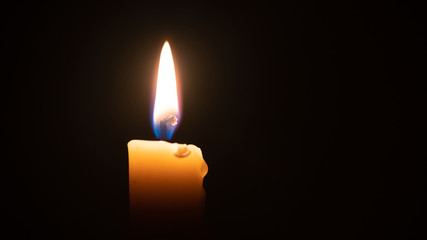 close up candle light in the dark macro photography texture background