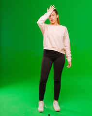young pretty latin woman raising palm to forehead thinking oops, after making a stupid mistake or...