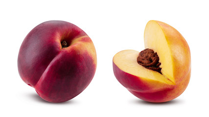Smooth-skinned whole nectarine and one cutted out with kernels isolated on white background with copy space for text or images. Close-up shot.