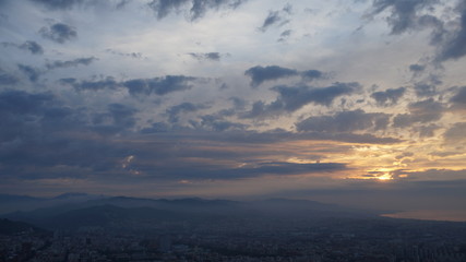 Dawn in Barcelona in the spring. View of Barcelona in the morning from the bunker