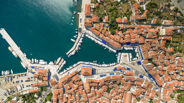 Aerial view of small Cres harbor full of boats, Croatia.