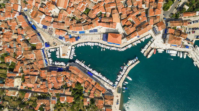 Aerial view of small Cres harbor full of boats, Croatia.