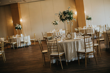 Fototapeta na wymiar Wedding banquet tables with flowers decoration