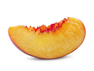 Fototapeta na wymiar Unpitted, smooth-skinned nectarine fruit slice isolated on white background with copy space for text or images. Close-up shot.