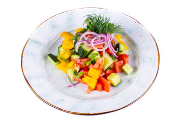 Vegetable salad with pieces of red onions and sunflower oil
