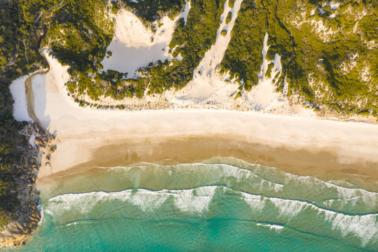 Aerial view of Squeaky Beach at national park during sunset, Australia.