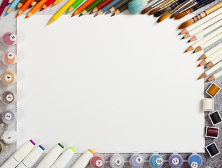 Artist workspace on gray background.