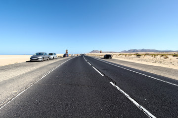 Road to nowhere in the dunes of Corralejo desert, Fuerteventura, Canary Islands
