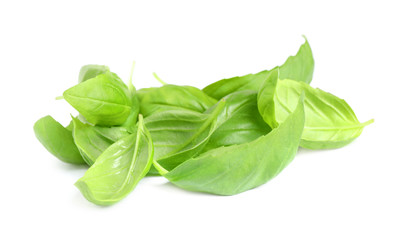 Fototapeta premium Pile of fresh basil leaves isolated on white