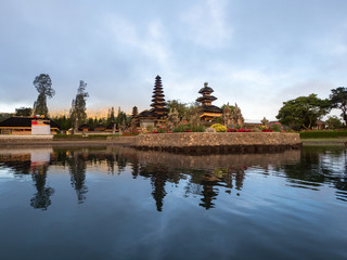 Indonesia, november 2019: Sunrise in Pura Ulun Danu Bratan, or Pura Beratan Temple, Bali island, Indonesia. Pura Ulun Danu Bratan is a major Shivaite and water temple on Bali island
