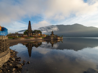 Indonesia, november 2019: Sunrise in Pura Ulun Danu Bratan, or Pura Beratan Temple, Bali island, Indonesia. Pura Ulun Danu Bratan is a major Shivaite and water temple on Bali island