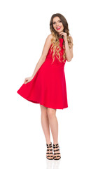 Cute Young Woman In Red Dress And Black High Heels Sandals