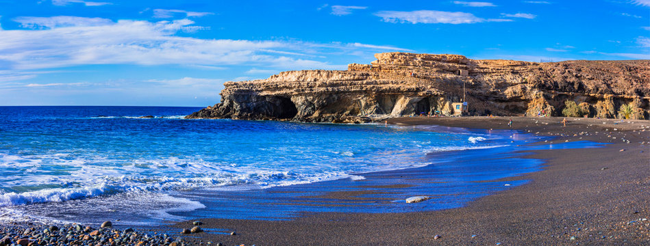 Black sandy beaches of volcanic Fuerteventura island, Ajui village. Canary islands