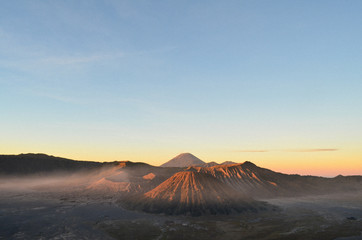 View of Mount Bromo and Batok during Sunrise from Penanjakan 2 or Seruni point,East Java, Indonesia.Beautiful color of the sky when the sun is rising.