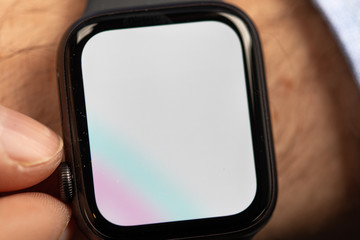 Close up of Businessman's hand looking at hand watch