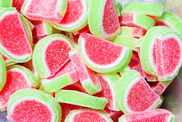Fruit jelly candy watermelon shaped slice. Top view