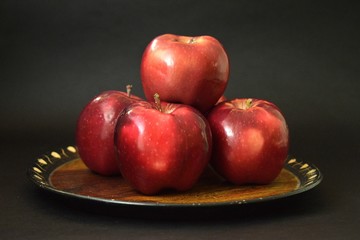 Red Apples On Wooden Plate Black Background