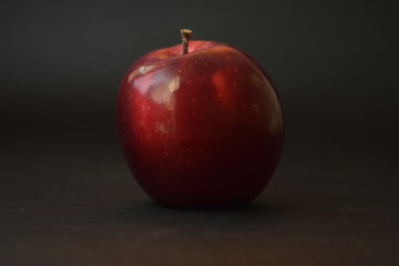 Red Apple In Dark Background