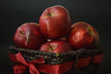 Red Apples In Brown Basket Whole And Cut