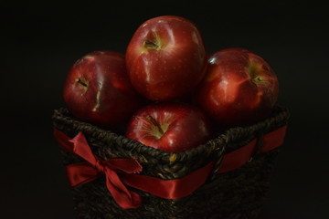 Red Apples In Brown Basket Whole And Cut