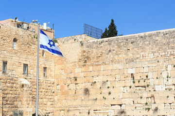 Western Wall and Flag of Israel with Star of David in Jerusalem Old City