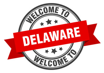 Delaware stamp. welcome to Delaware red sign