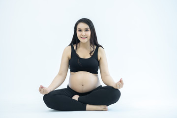 Pregnant women exercising separately from the white backdrop - yoga concepts for pregnant women