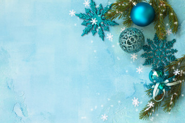 New Year concept background. Christmas composition Christmas decor on a blue background. Top view...