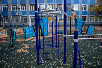 Fototapeta na wymiar Sports ground with exercise equipment for the physical development of children and adults