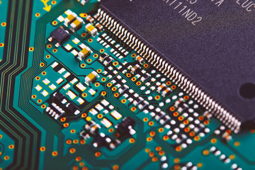 Electronic circuit board close up.