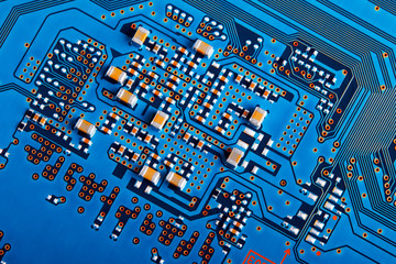 Electronic circuit board close up.