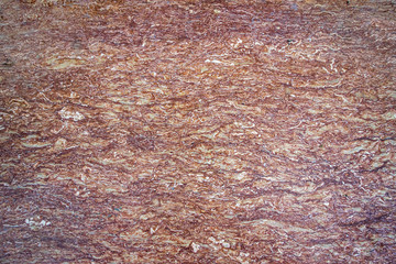 Brown red white marble texture background. Granite floor tile decorative. Wavy patterns on marble slab.
