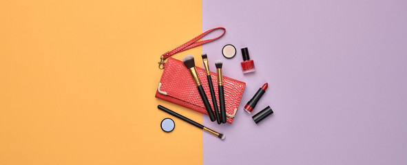 Fashion beauty product layout. Woman Essentials cosmetic makeup Set. Collection beauty accessories. Trendy Clutch, Brushes, lipstick, accessories. Coloful art Flat lay.Creative make up concept, banner