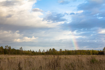 Fototapeta na wymiar autumn landscape with a rainbow