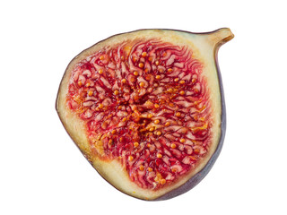 Half of a purple fig isolated on white background with copy space. Soft, sweet fruit, skin is thin, red flesh has many seeds inside of it. Close-up.