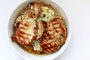 Baked pork loin with onions