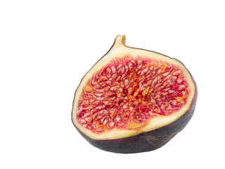 Half of a purple fig isolated on white background with copy space. Soft, sweet fruit, skin is thin, red flesh has many seeds inside of it. Close-up.
