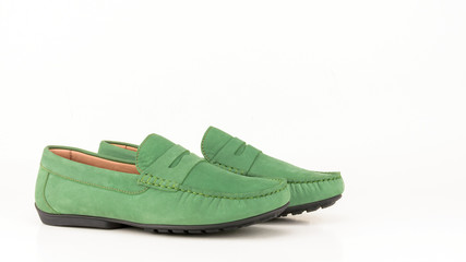Green suede men moccasin isolated on white.