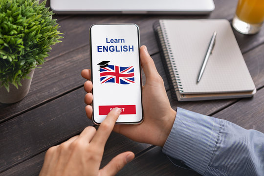 App For Learning English Opened On Smartphone In Man's Hands