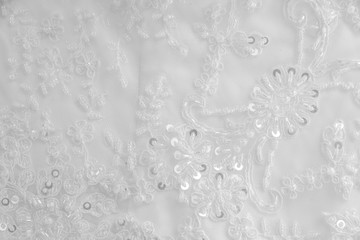 A detailed picture  the wedding dress closeup