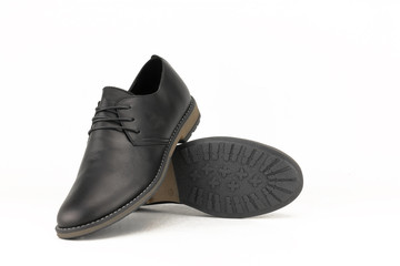 Black leather derby isolated on white background.
